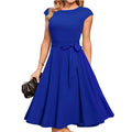 Black sleeveless party dress with lace-up waist and oversized swing skirt on a mannequin
