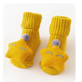 Cotton baby floor socks with non-slip soles in a pink bow print design.