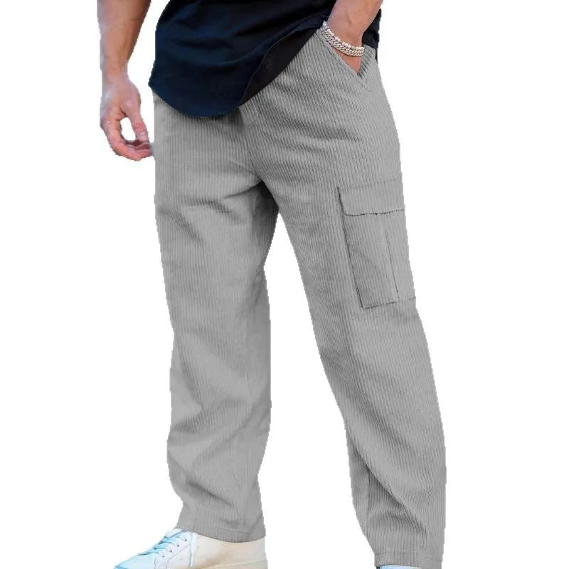 Men's straight-leg corduroy cargo trousers in a loose wide-leg fit with a drawstring waist.