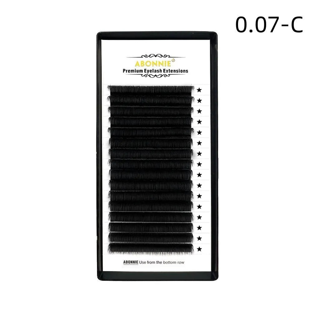 Dense 16-row false eyelashes made from mink hair in a matte round wool style on a clear strip.