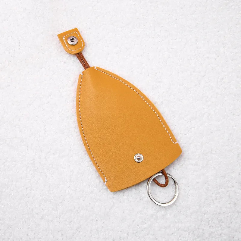 Cartoon pull-out key case in PU leather measuring 14 by 7.5 centimetres