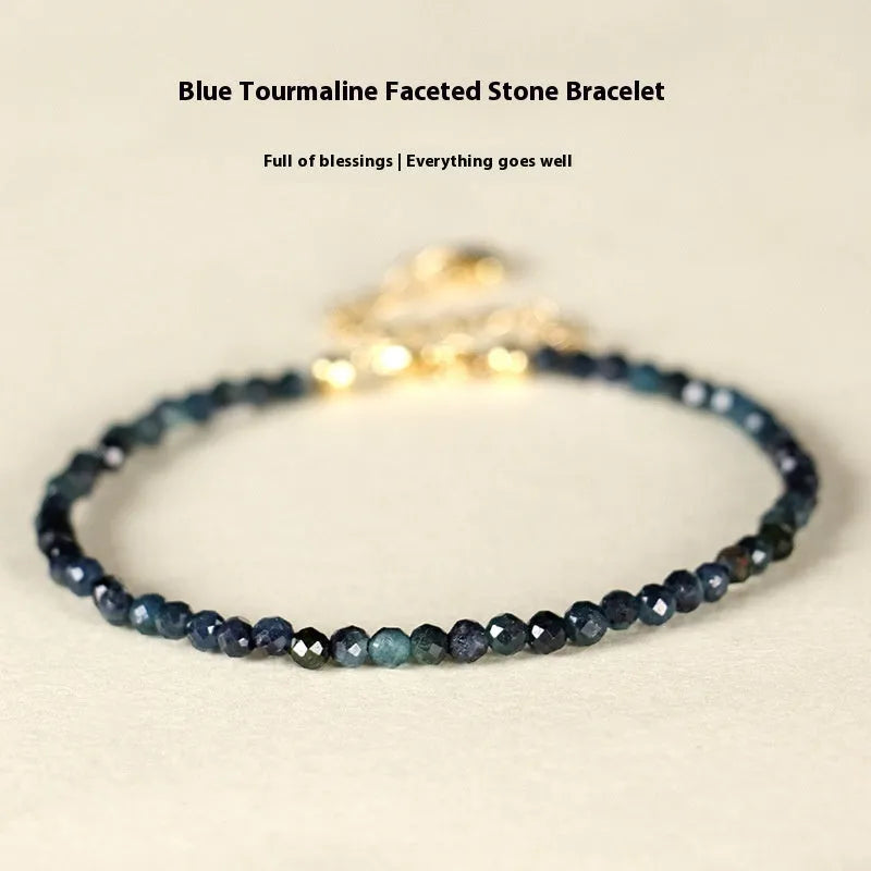 Blue tourmaline beaded bracelet with 3mm stones and spacer bead sections