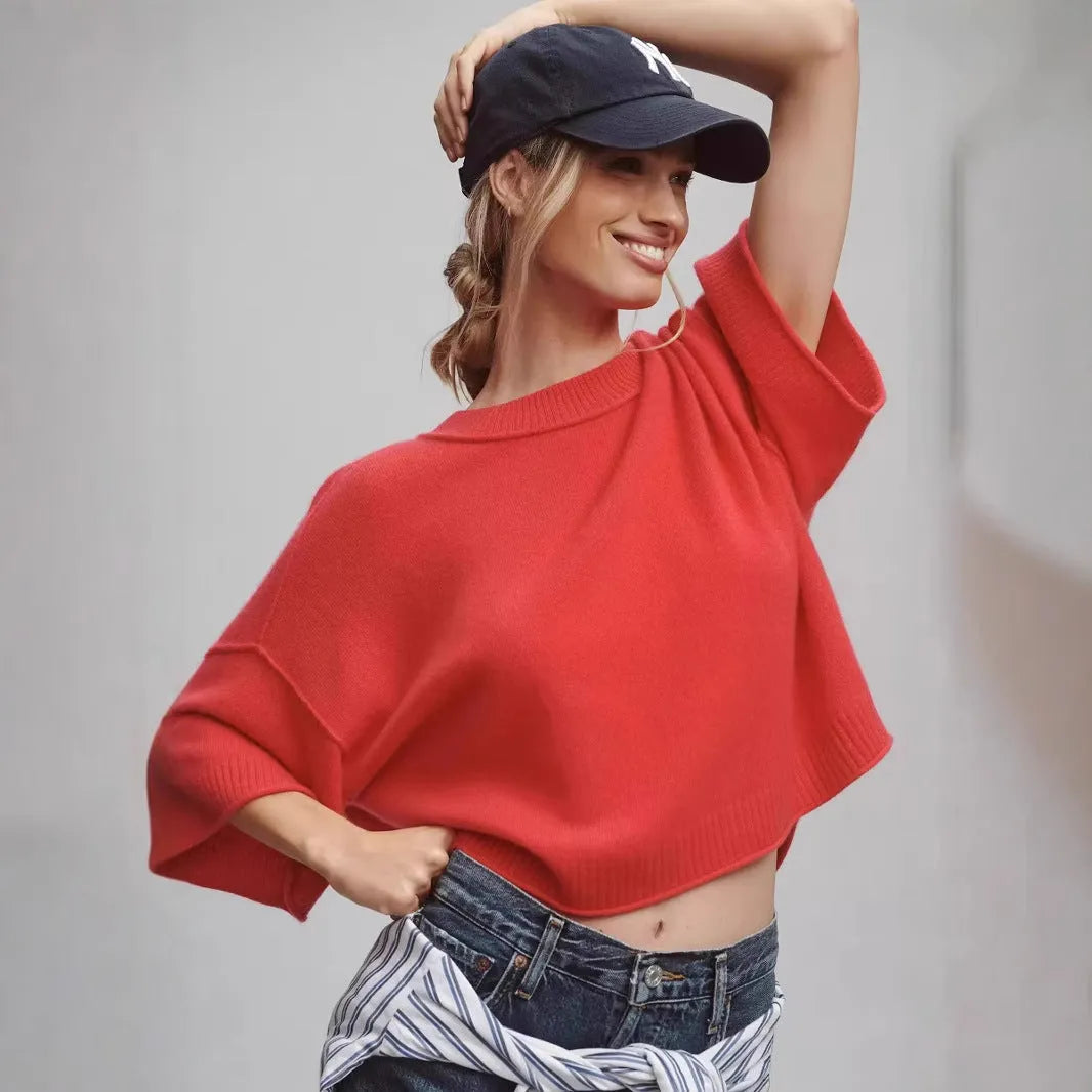 Women's red short t-shirt with V-neck and regular sleeves on white background