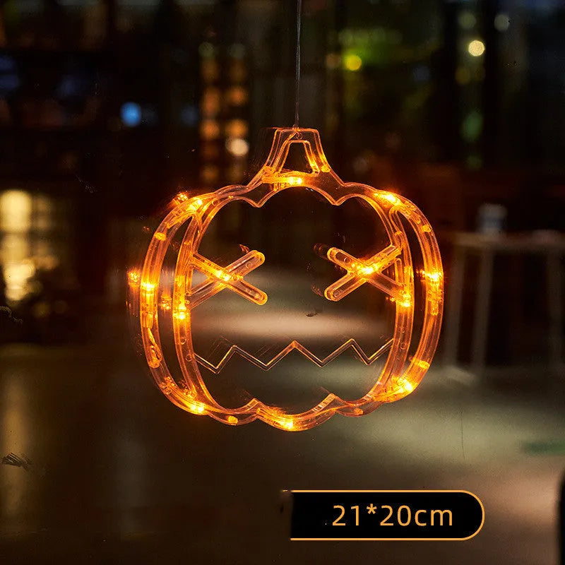 Seven Halloween themed battery-operated LED hanging lights with spider, pumpkin and ghost designs