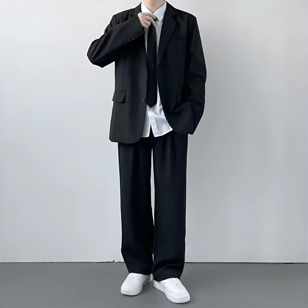 Plus size men's loose fit college style suit set with trousers, white shirt, and tie on a hanger.