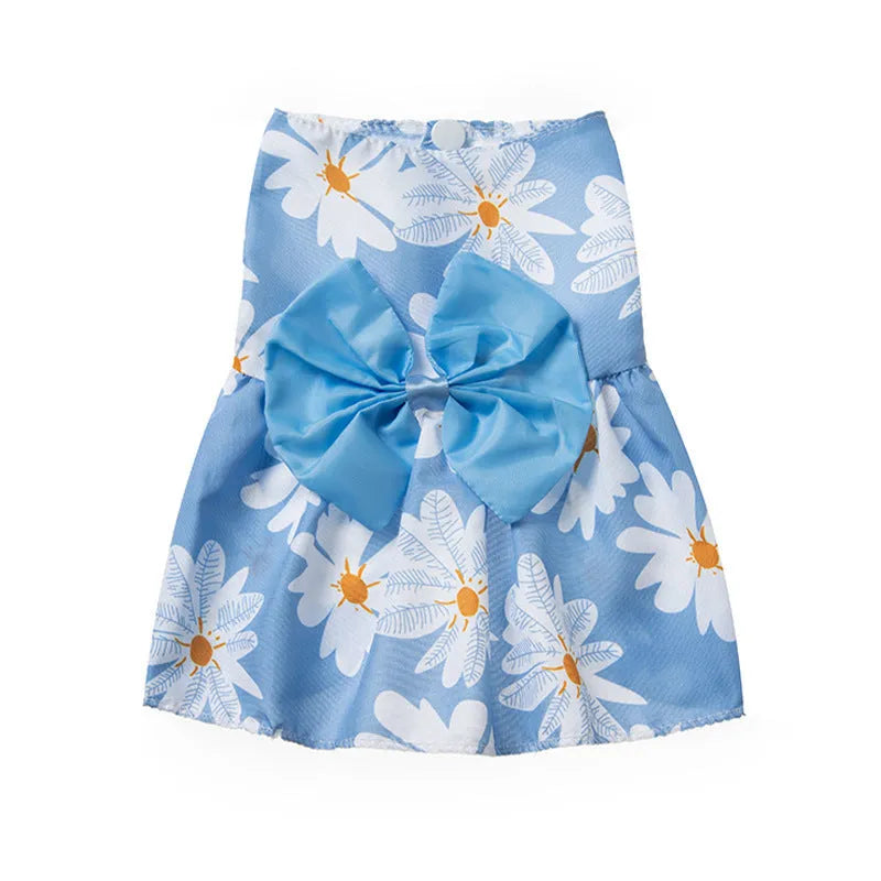 Orange bow floral butterfly pattern polyester dress on a small dog