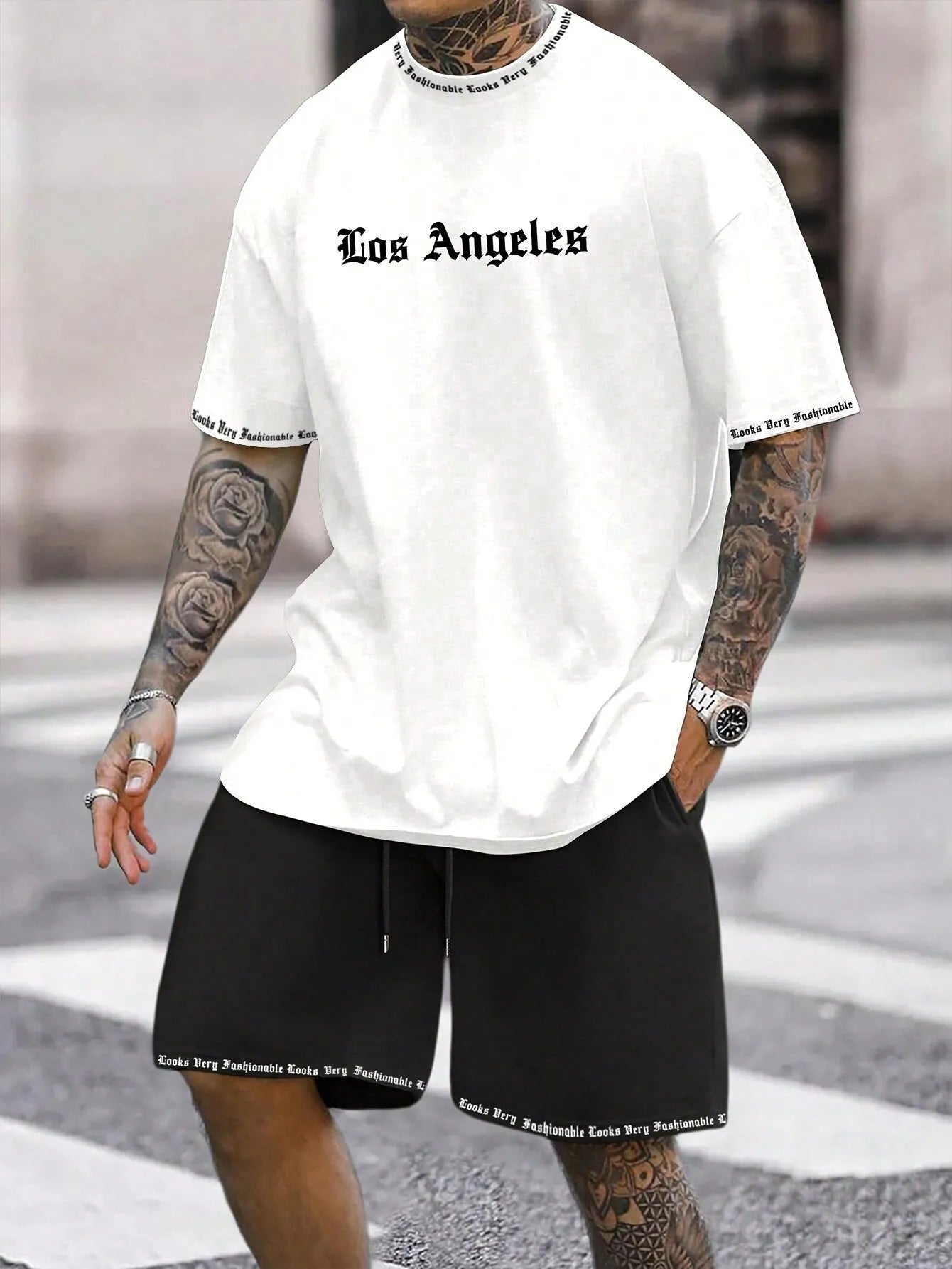 Sports-style short sleeve shirt and matching shorts set in a printed pattern, shown in colour G23P1573.