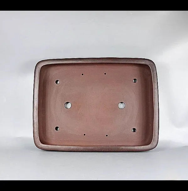 Handmade rectangular purple clay flower pot with antique finish showing natural colour variation