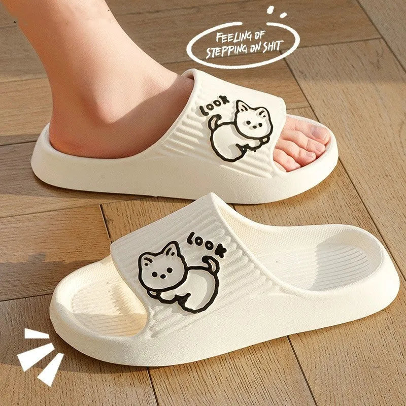 Green EVA foam cat slippers with thick platform sole and anti-slip pattern.