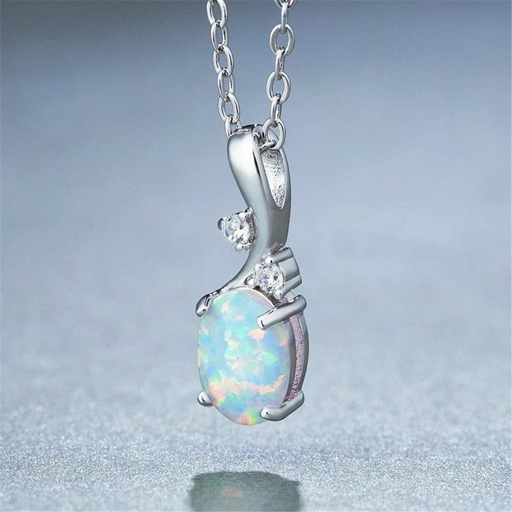 Water drop shaped opal pendant necklace with adjustable O-chain in white gold finish