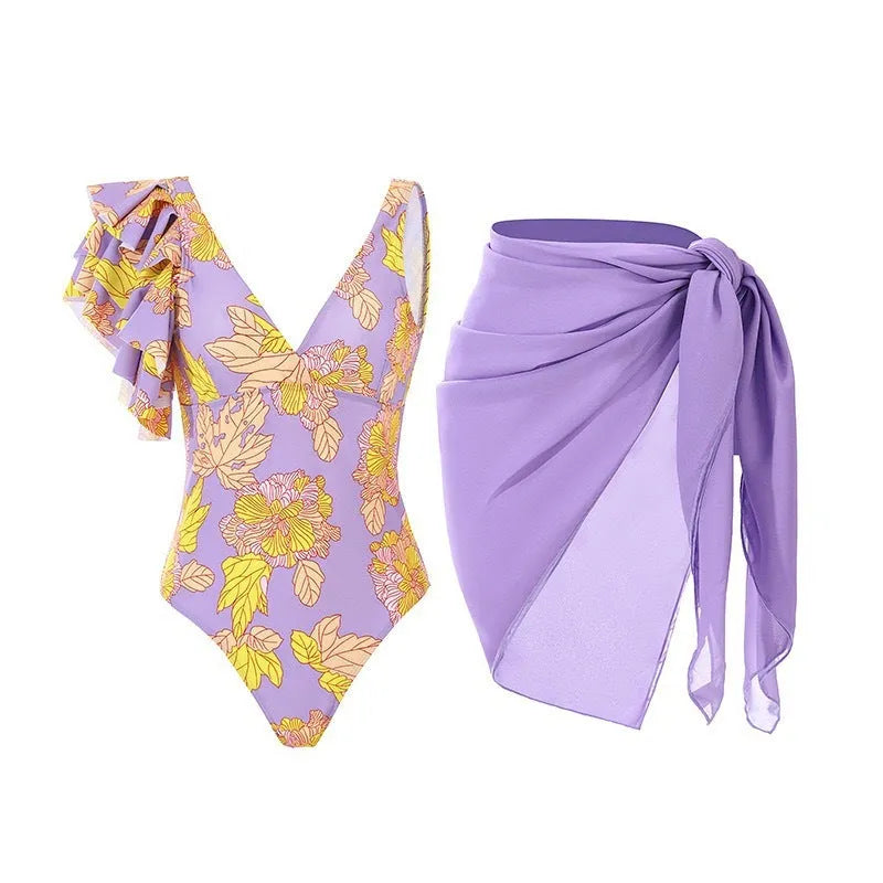 Women's solid colour one-piece swimsuit with spaghetti straps and a removable skirt attached