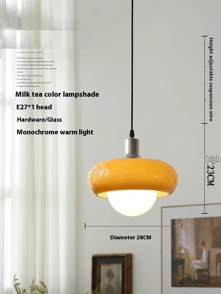 Bauhaus retro style glass pendant ceiling light with three egg tart shaped shades in milk white finish.