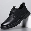 Men's black leather business sneakers with sewing line details on two-layer cowhide upper and rubber sole