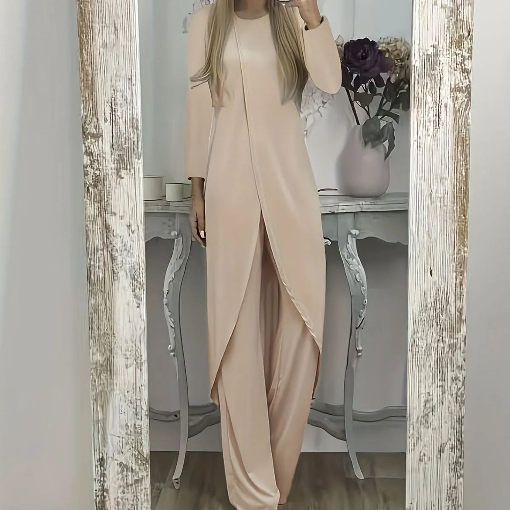Black loose fit casual two-piece lounge set with long sleeve top and trousers on a hanger.
