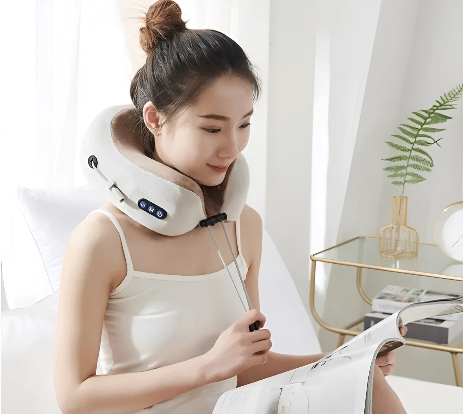Brown U shaped electric neck massage pillow with USB charging port and control buttons