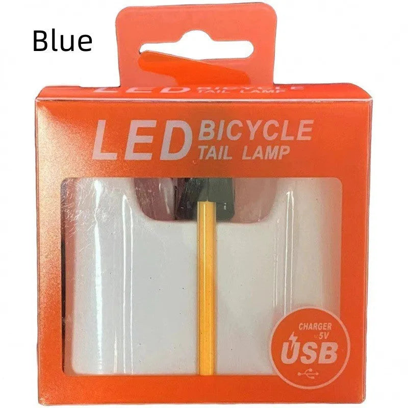 USB-charging waterproof bicycle rear taillight in blue, pink, red, white, or yellow colour options