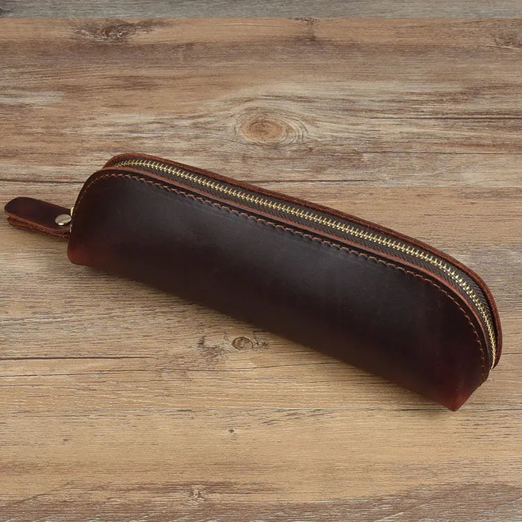 Square leather pencil case with zip closure in black colour showing 18cm dimensions