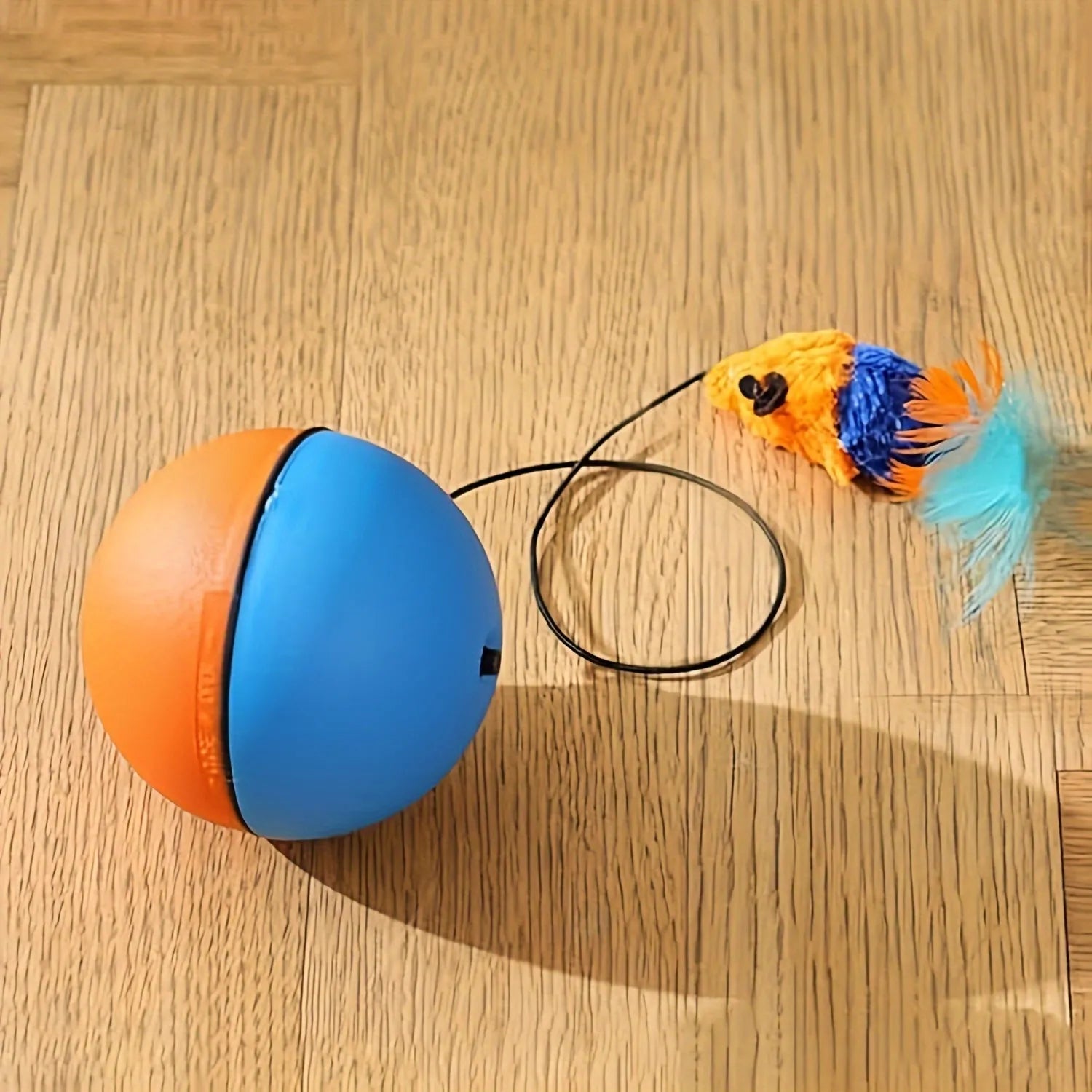 Blue and orange interactive cat toy ball with plush mouse attachment measuring 8.5cm