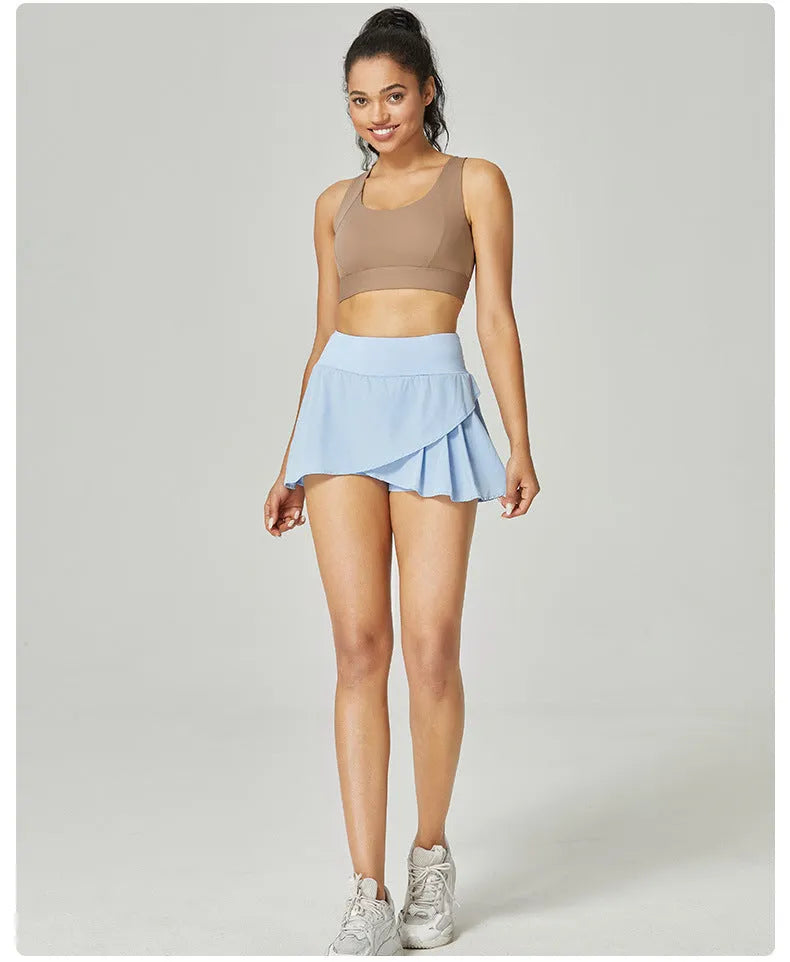 Women's solid colour quick-dry sports shorts in nylon with a spandex lining, shown in multiple colour options.