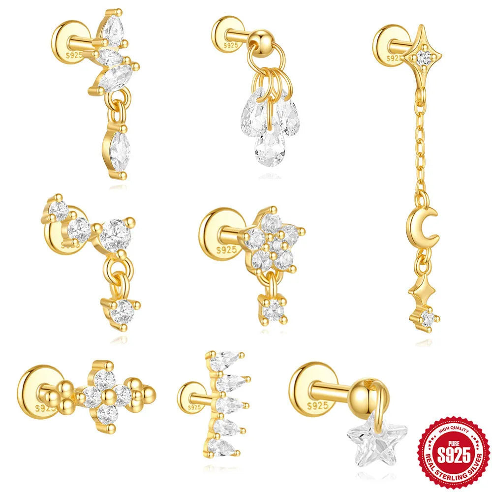 S925 sterling silver geometric moon and star earrings with diamond detail on a gold tone background.
