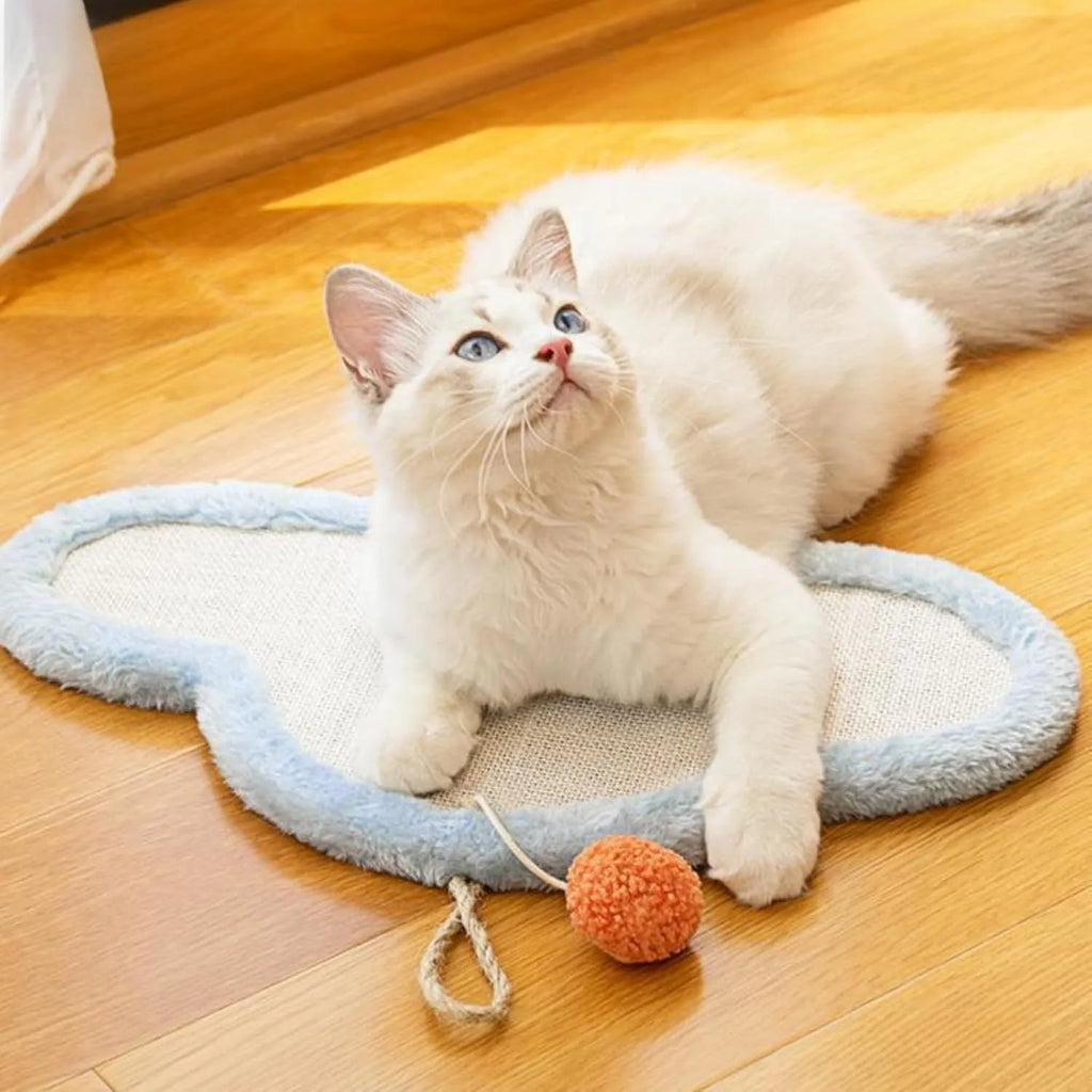 White cat scratching mat with sleeping cat pattern, natural sisal construction, wall mounted design