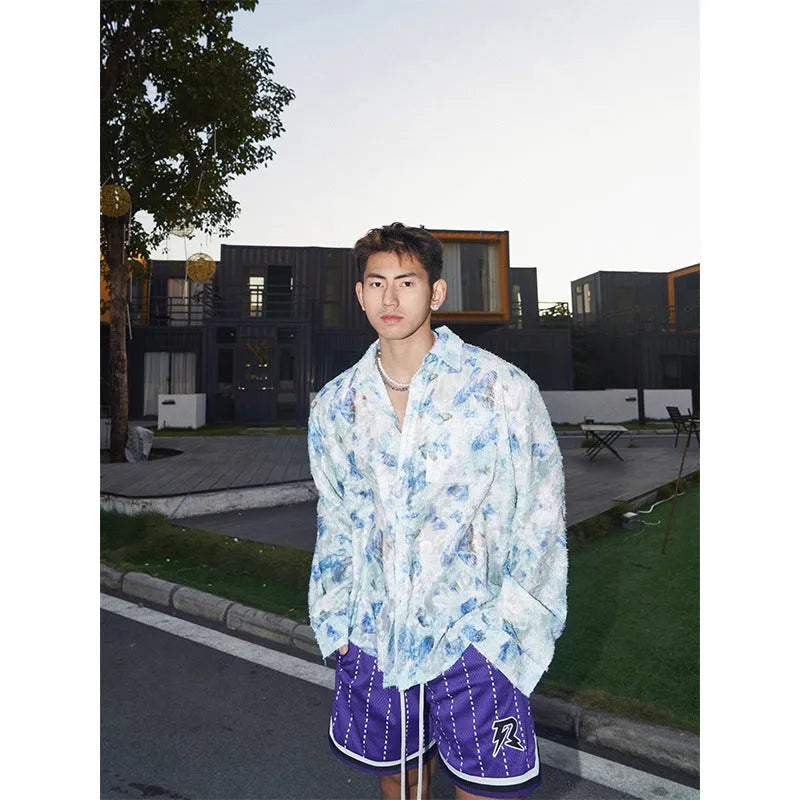 Blue floral long sleeve shirt with embossed pattern and loose fit
