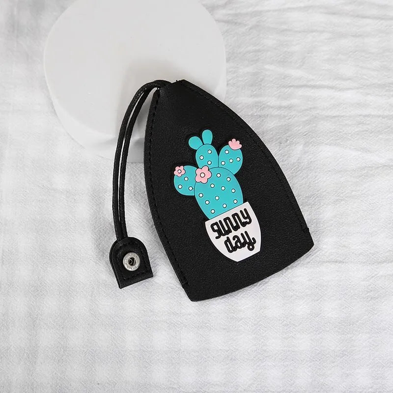 Cartoon pull-out key case in PU leather measuring 14 by 7.5 centimetres
