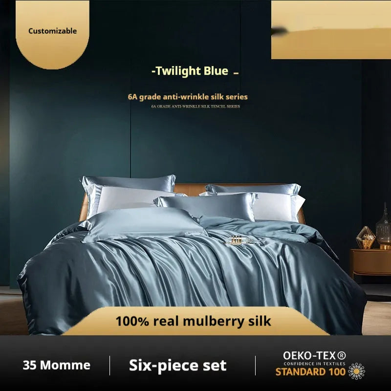 Silk four-piece bed set in a solid colour showing duvet cover and matching pillowcases.