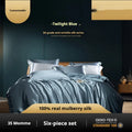 Silk four-piece bed set in a solid colour showing duvet cover and matching pillowcases.
