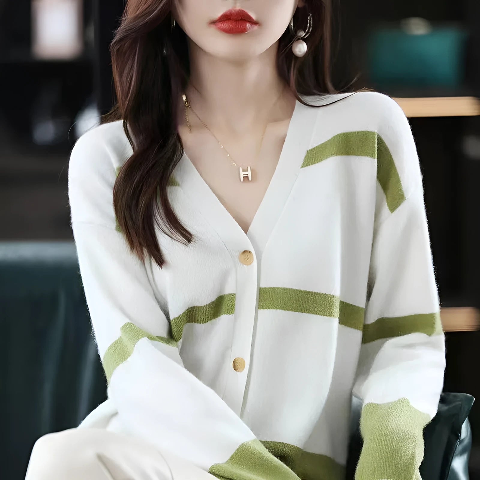 Women's striped V-neck knitted cardigan with 3D pattern in camel colour.