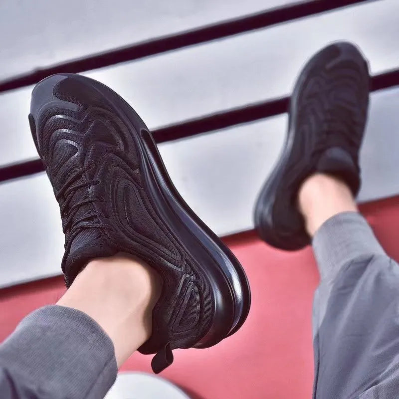 Men's black lace-up air cushion running shoes with a thick sole and round toe.
