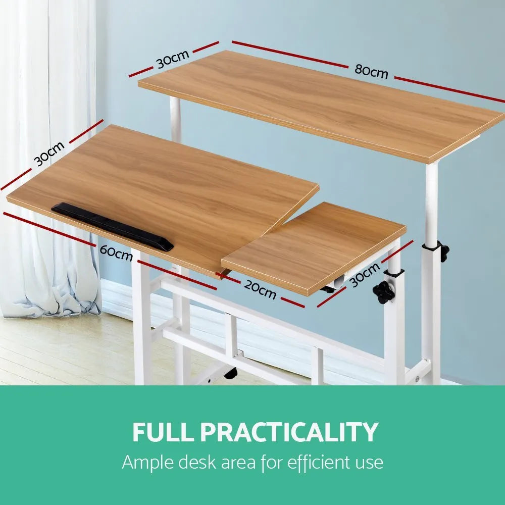 Mobile computer lifting foldable standing desk in bedroom with adjustable height and modern simple style