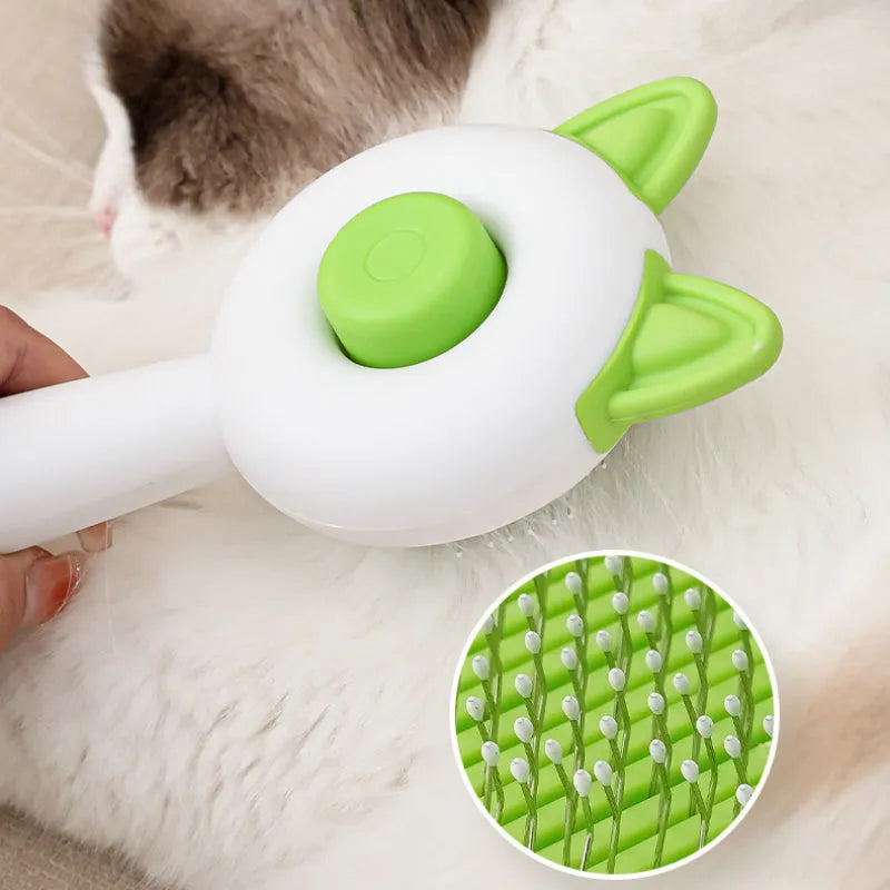 Self-cleaning cat grooming comb in greenish white and orange white colour options