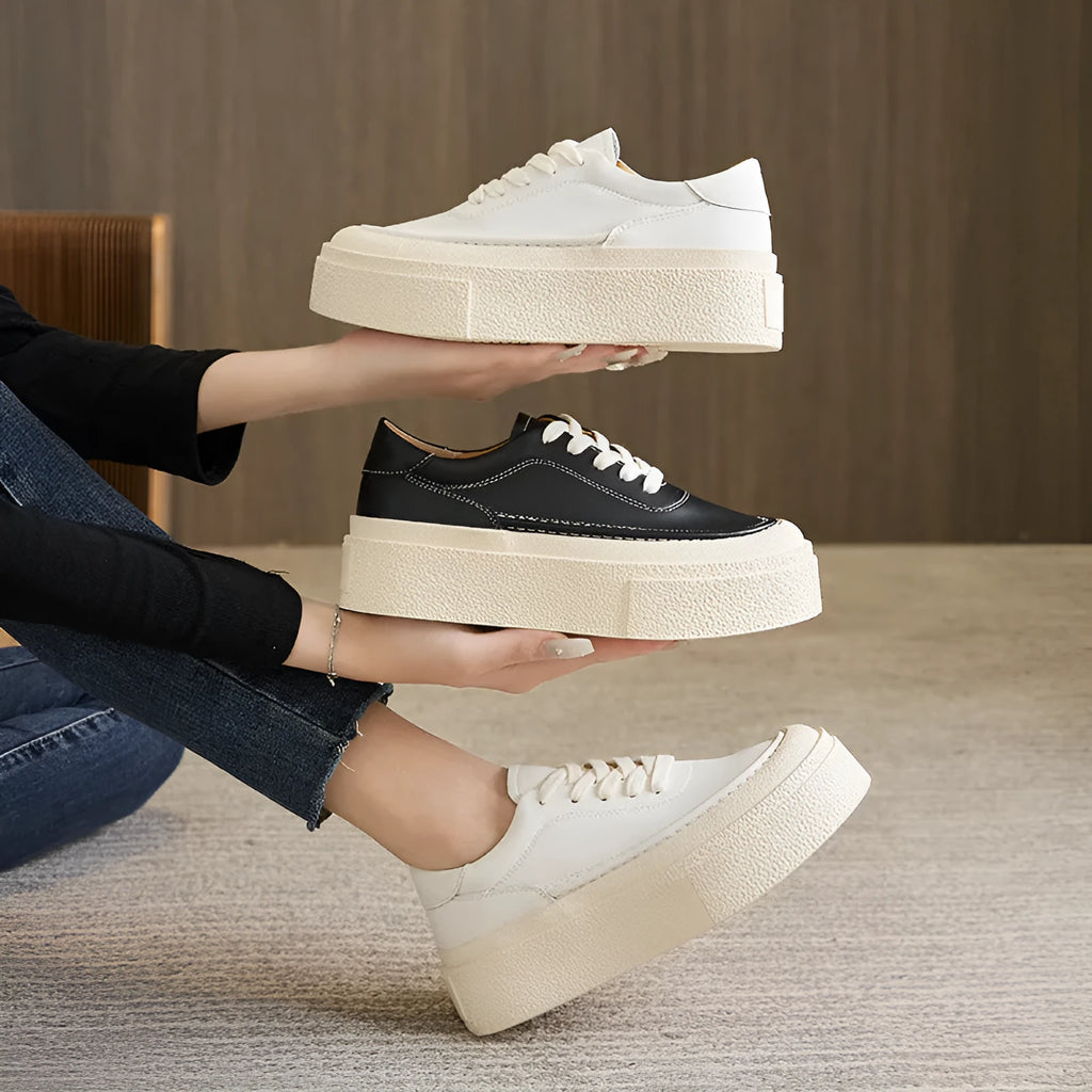 Women's black platform sports board shoes with embossed cowhide upper and lace-up closure
