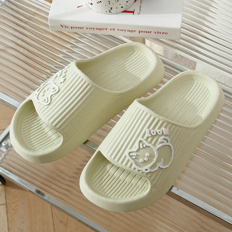 Green EVA foam cat slippers with thick platform sole and anti-slip pattern.