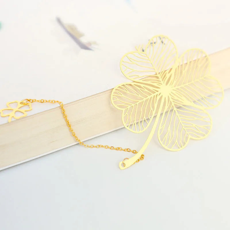 Brass metal bookmark with hollow plating decorative leaf pattern and rose gold tassel