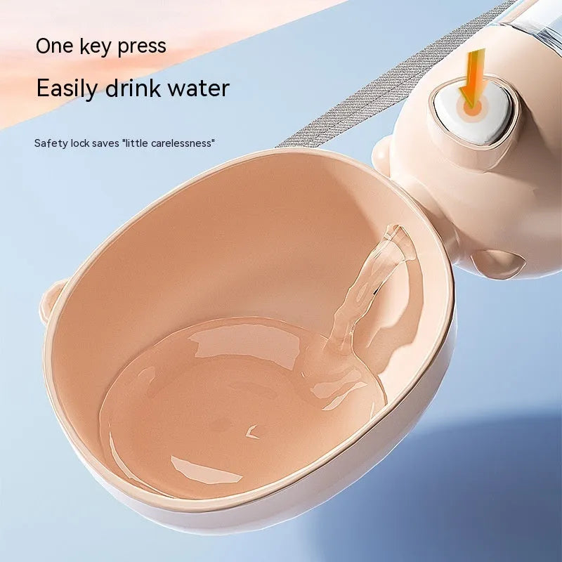Portable plastic dog water bottle with an attached drinking bowl in yellow, pink, or brown.
