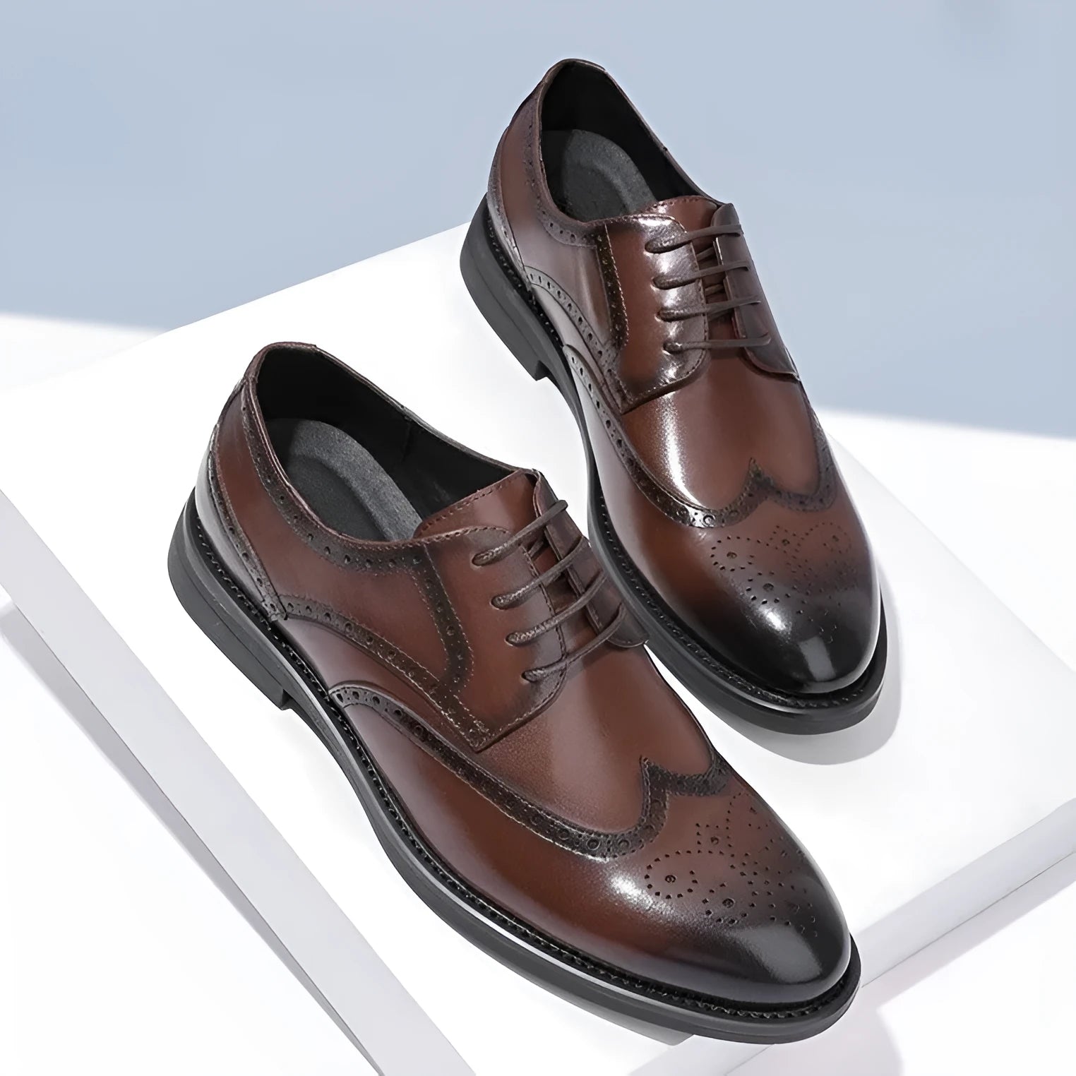 Men's black and brown brogue leather business shoes with traditional perforated decoration