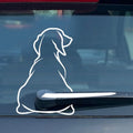 Black and white options of a cartoon dog with wiper rear window car sticker set showing body and tail dimensions.