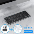 Ultra-thin silent wireless keyboard and rechargeable mouse set in black, gunmetal, or silver.