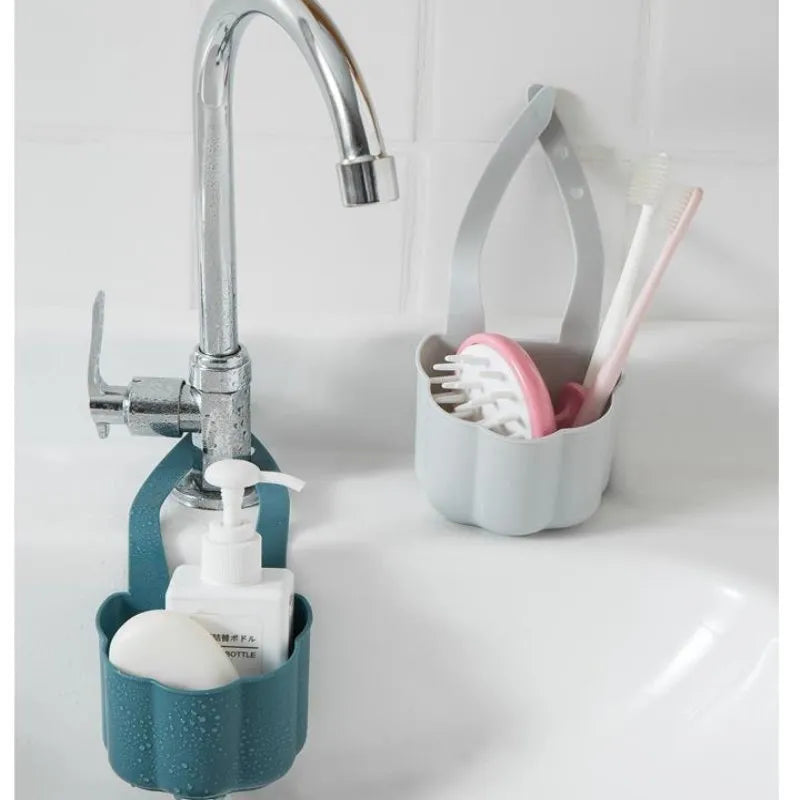 Plastic sink drain basket in dark blue colour showing 20cm length and 10cm width dimensions