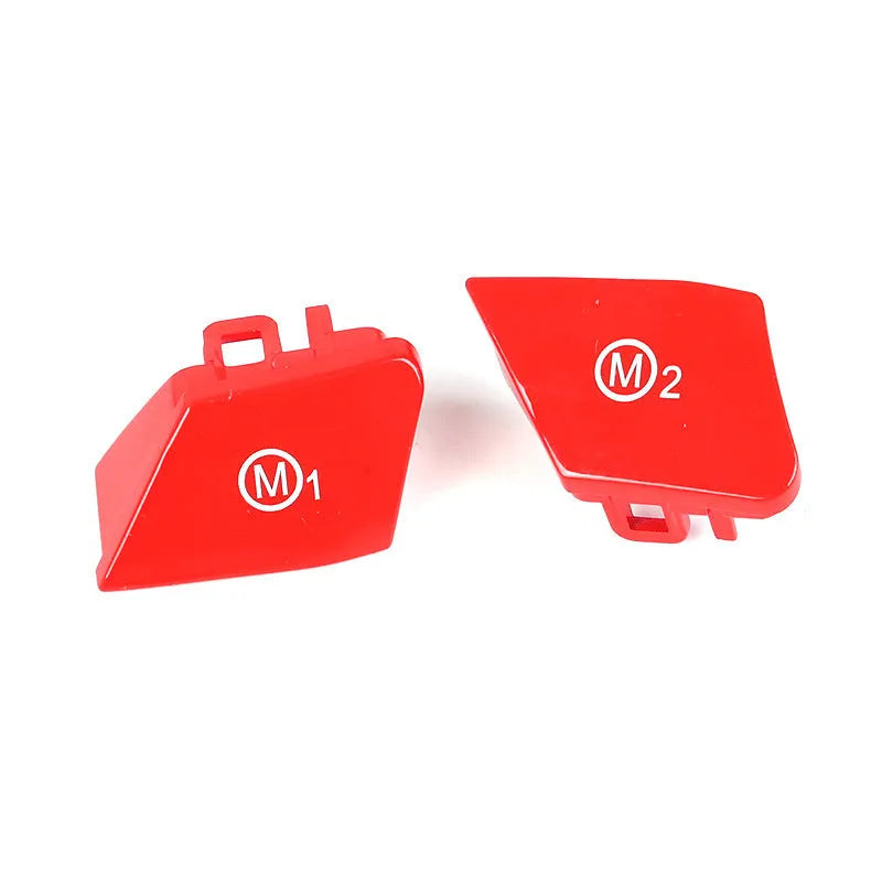 Pair of red and blue M1M2 steering wheel mode buttons for BMW F30 and F34 models with installation keys.