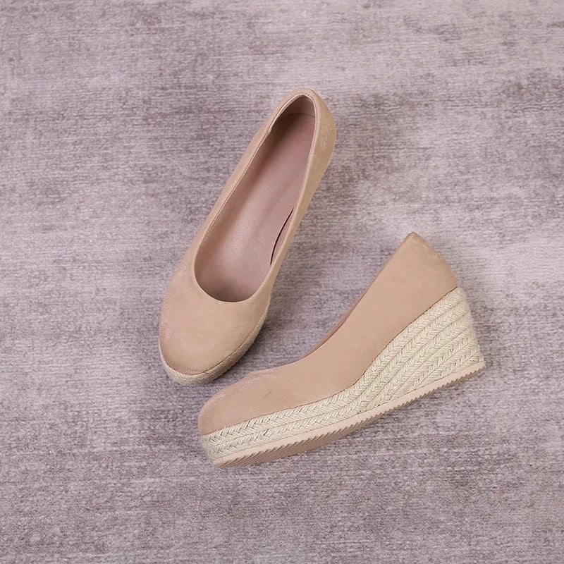 Wedge heel pumps with thick sole and rope detail in apricot, showing shallow cut design.