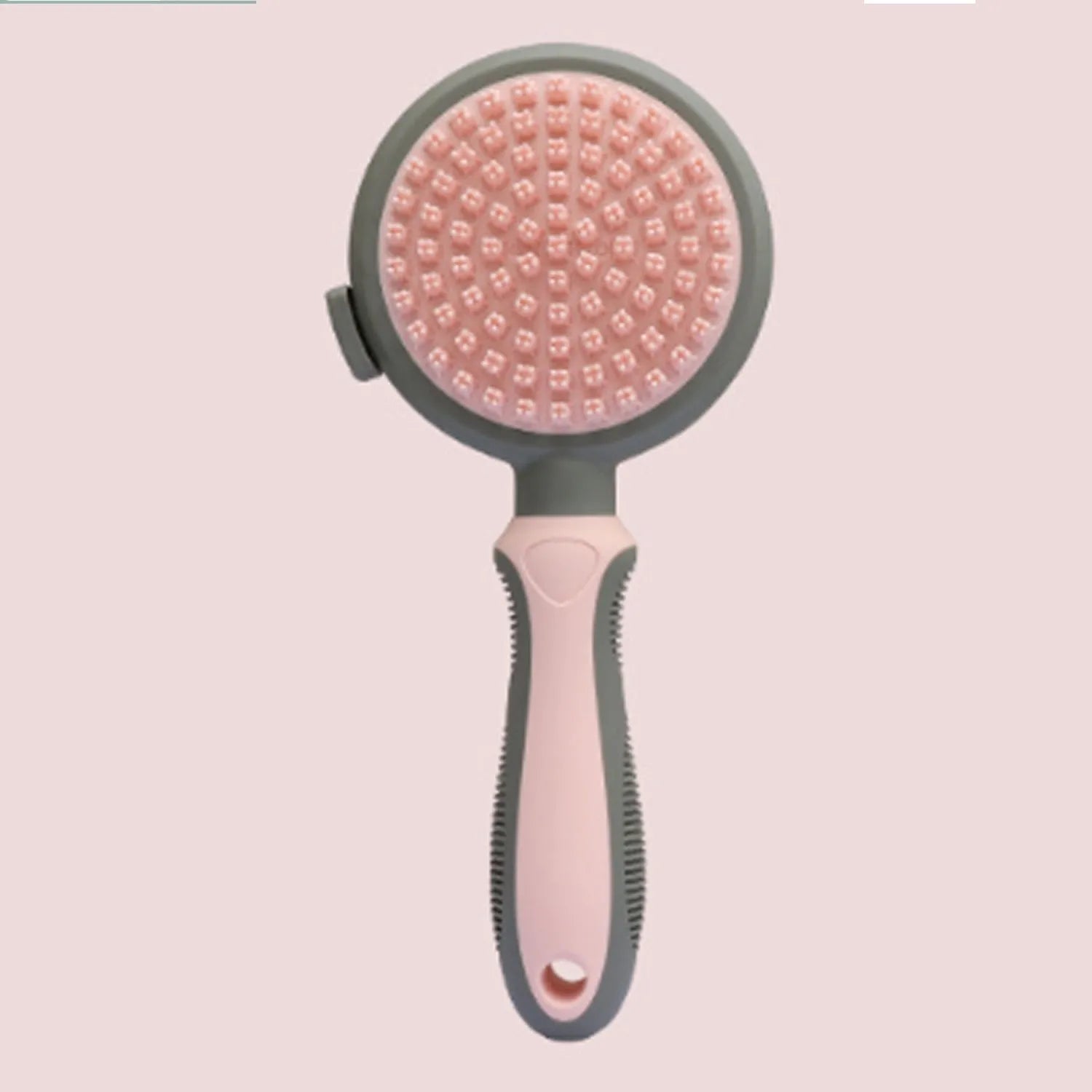 Green and pink double-sided cat brush with release button and flea comb for pet grooming