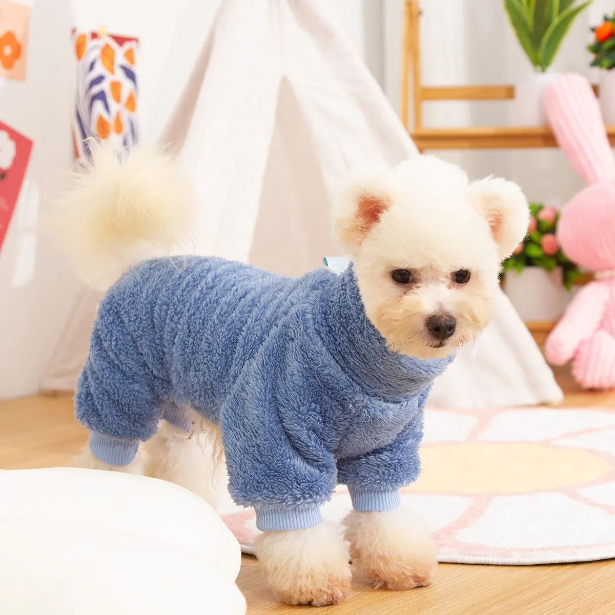 A khaki double-sided plush four-legged dog coat with a high collar and a metal towing ring on the back.