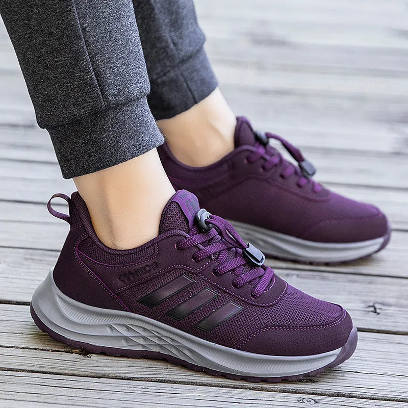 Casual breathable mesh slip-on shoes for men and women with elastic band and non-slip sole.