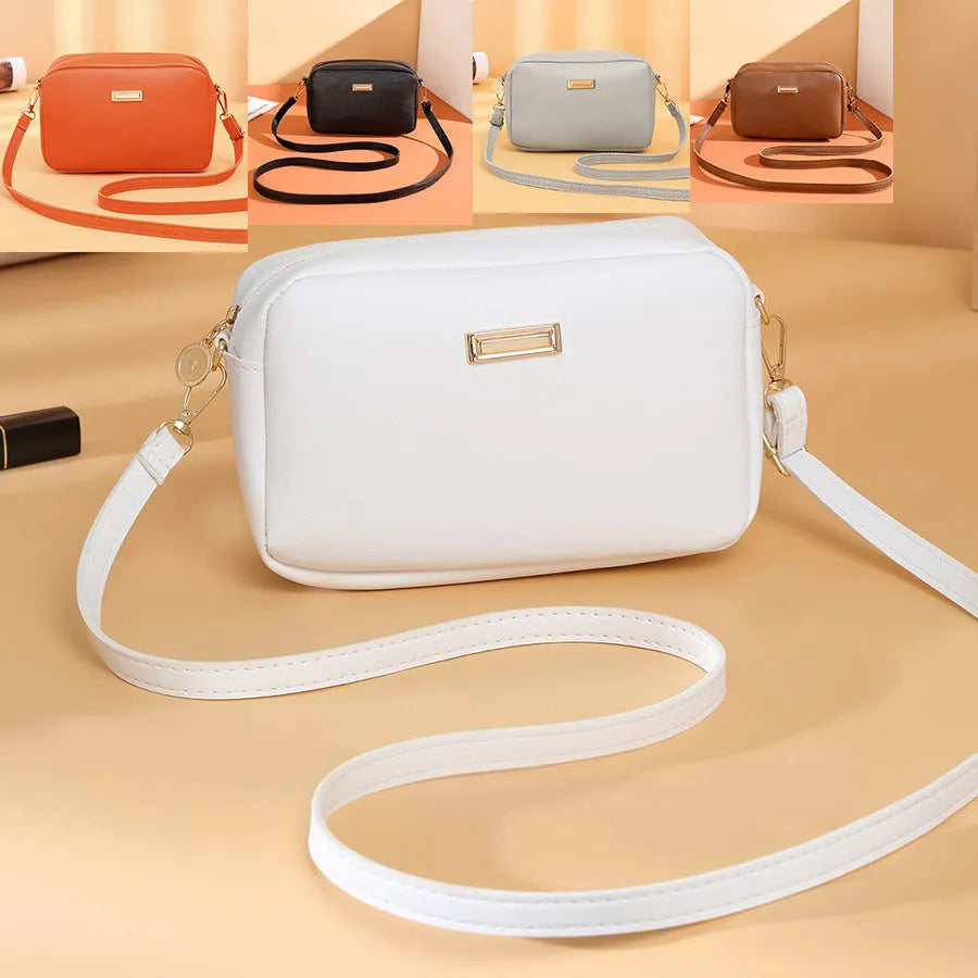 Solid colour minimalist ladies shoulder bag in PU leather with a three-dimensional pocket