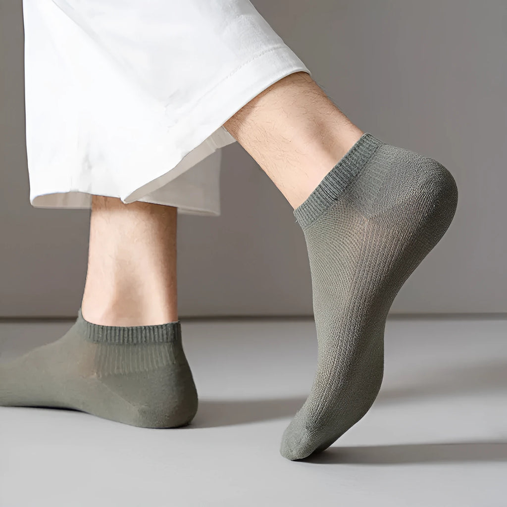 Men's solid colour polyester low-cut boat socks shown in multiple colour options