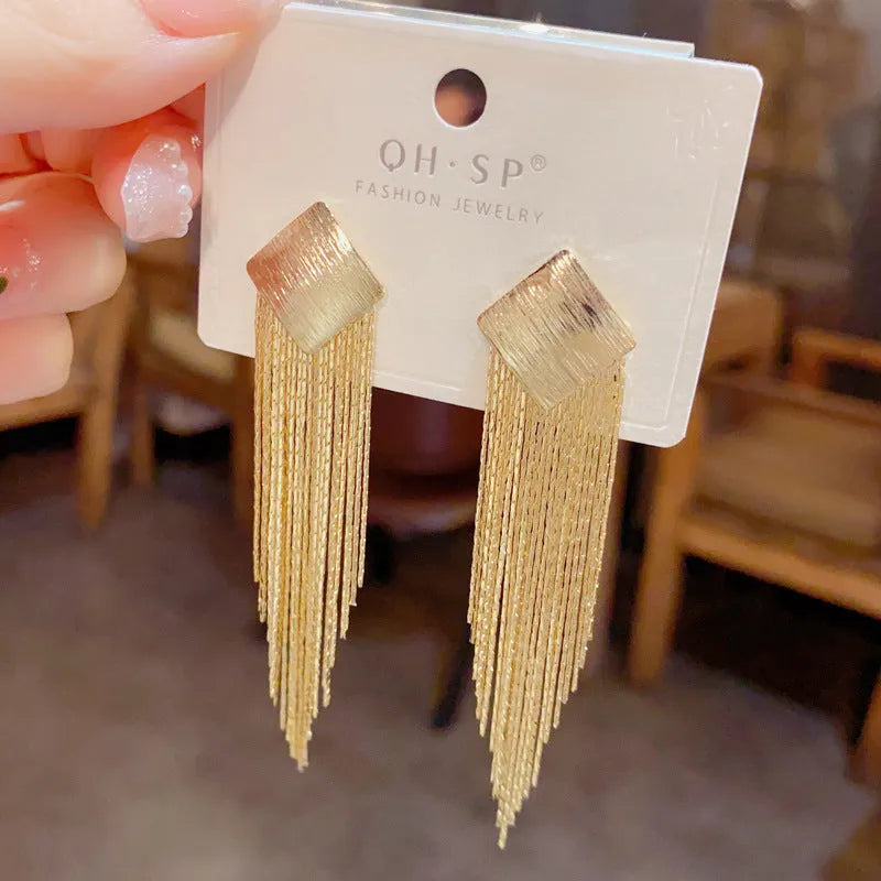 Pair of geometric tassel earrings with electroplated copper finish and real gold colour retention, simple style for women