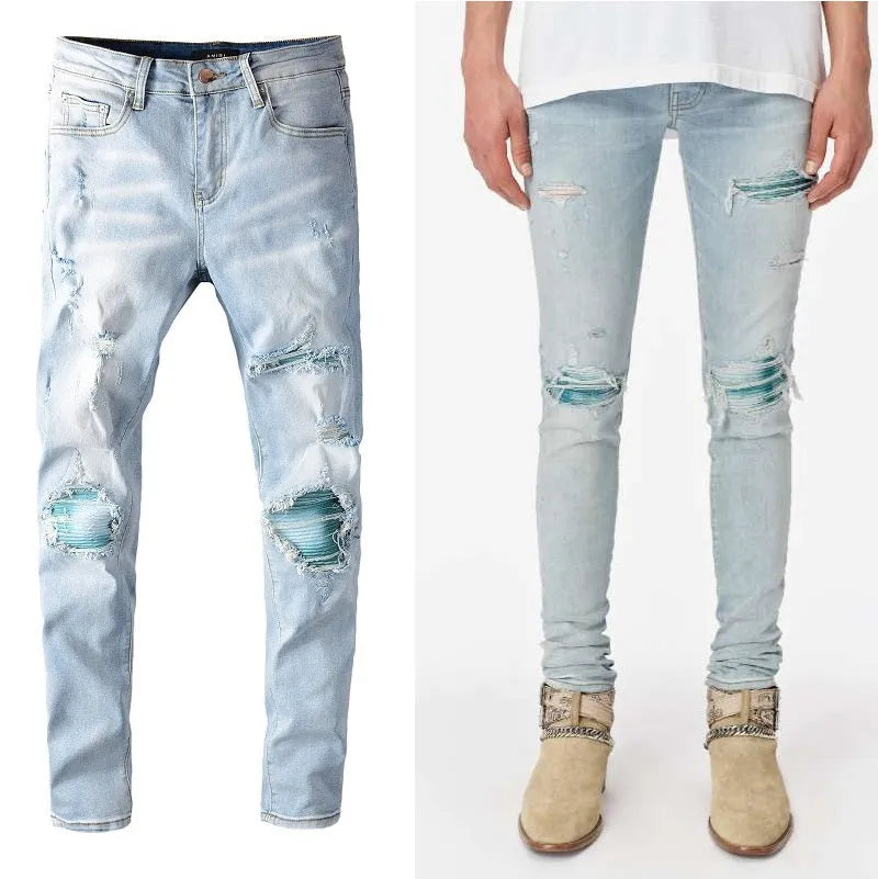 Men's light blue distressed slim fit jeans with five pocket patchwork, enzyme washed, side view